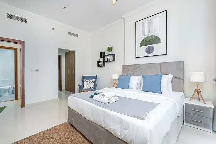 Luxe Apartments near Dubai Mall, Burj Khalifa - Pool, Gym, and Parking by Sojo Stay